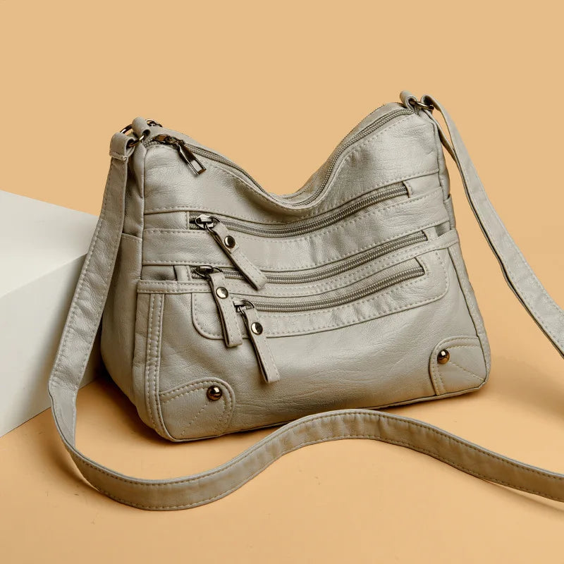 Multi-Zipper Vegan Leather Crossbody Bag with Adjustable Shoulder Strap